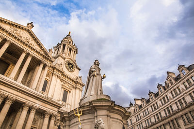 Low angle view of statue against sky