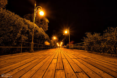 Illuminated street light at night