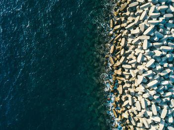 Aerial view of groyne by sea