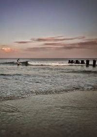 Scenic view of sea at sunset