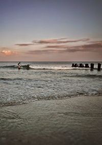 Scenic view of sea at sunset