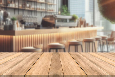 Close-up of wooden table at restaurant