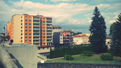 Buildings in city against sky