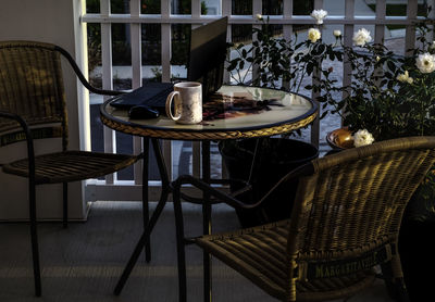 Empty chairs and tables at cafe