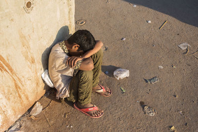 Father and son on ground