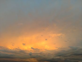 Low angle view of dramatic sky during sunset