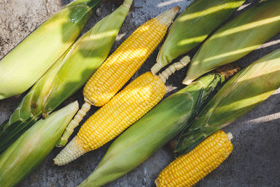 High angle view of corns in wooden container