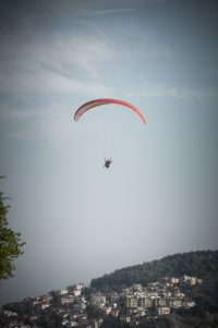 People paragliding in sky