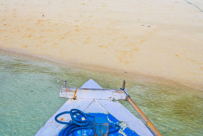 High angle view of boat moored on beach