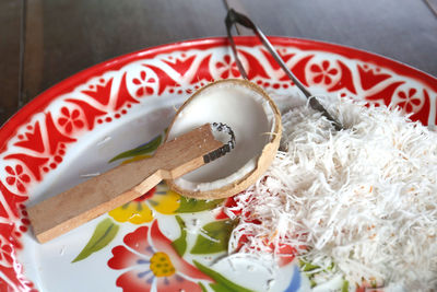 High angle view of chopped slices in bowl on table