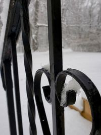 Close-up of frozen railing during winter