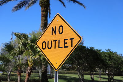 No outlet sign on suburban street