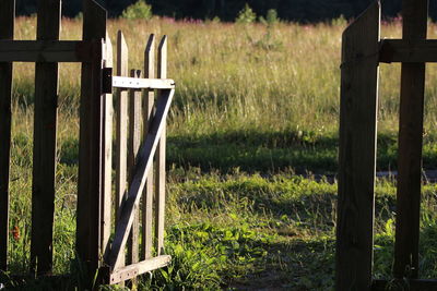 Wooden post on field