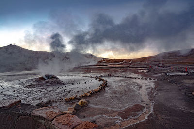 Panoramic view of desert against sky