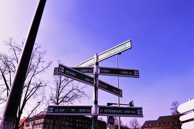 Low angle view of communications tower against sky