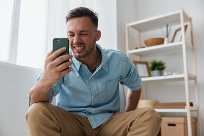 Young woman using mobile phone