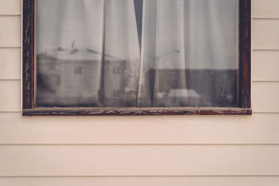 Close-up of curtain against window