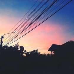 Electricity pylons at sunset