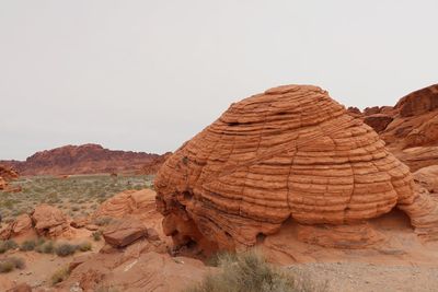 Rock formation in desert against clear sky