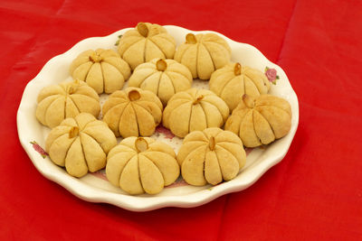 High angle view of cookies in plate on table