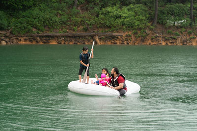 People on boat in water