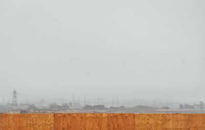 Distant view of field against sky