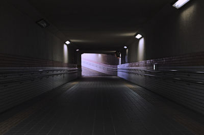 People walking in tunnel