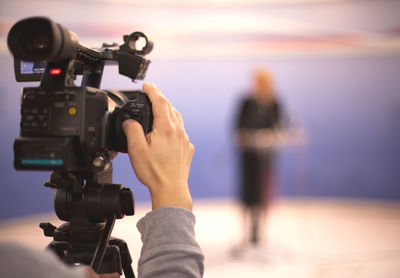 Midsection of man photographing