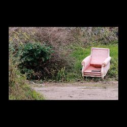 Empty seats in grassy field