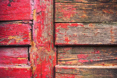 Old painted boards with red paint,