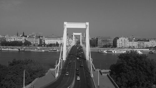 Elisabeth bridge over danube river against clear sky