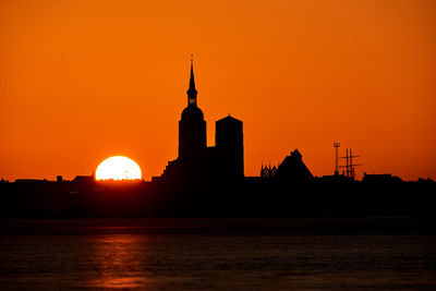 Silhouette city at sunset