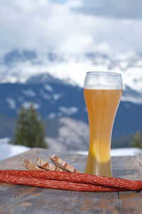 Close-up of beer glass on table