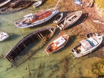 High angle view of abandoned boat moored at harbor