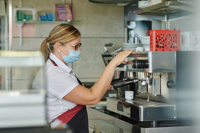 Woman working in tray