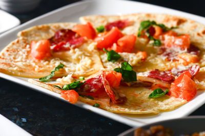 High angle view of pizza on table