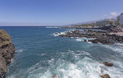 Scenic view of sea against clear sky