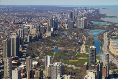 Aerial view of cityscape by sea