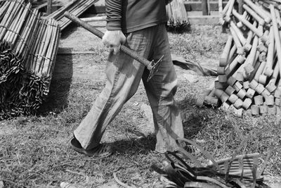 Low section of man working at construction site