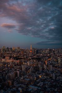 Aerial view of cityscape against sky at dusk
