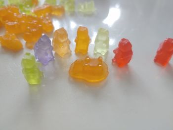 High angle view of multi colored candies on table