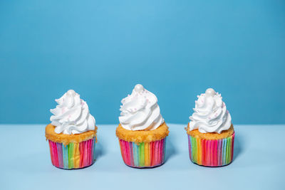 Close-up of ice cream against blue background