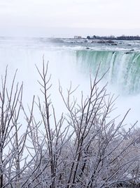 Scenic view of frozen sea against sky
