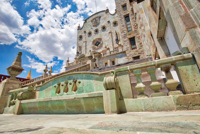 Exterior of historic building against sky