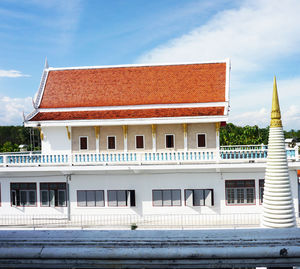 Building against cloudy sky