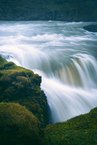 Scenic view of waterfall in forest