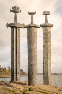 Swords in rock monument in hafrsfjord, norway, neighborhood of madla, a borough city of stavanger