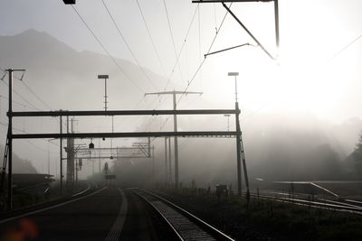 Train on railroad track against sky