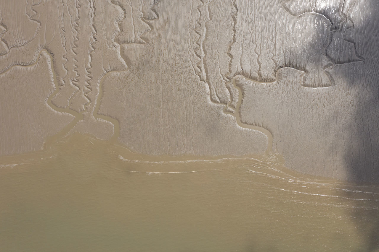 FULL FRAME SHOT OF PAINTING ON BEACH