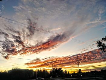 Low angle view of vapor trails in sky